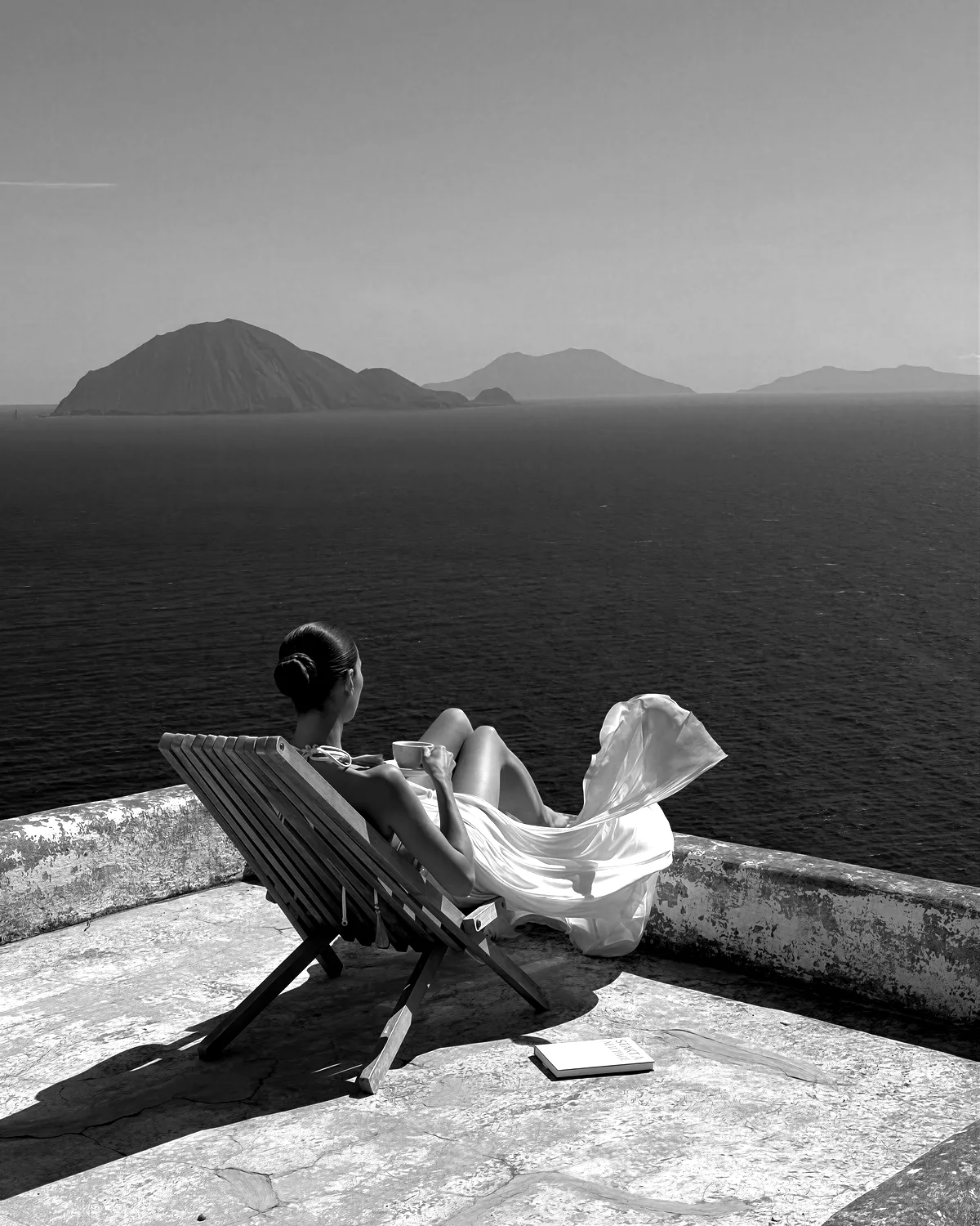 Looking out over the Aegean Sea from a sunlit terrace
